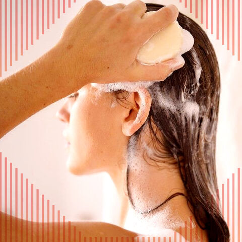 Woman using a shampoo bar
