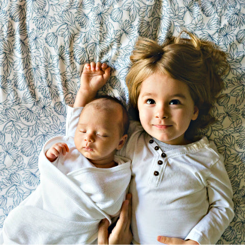 New born baby with sibling