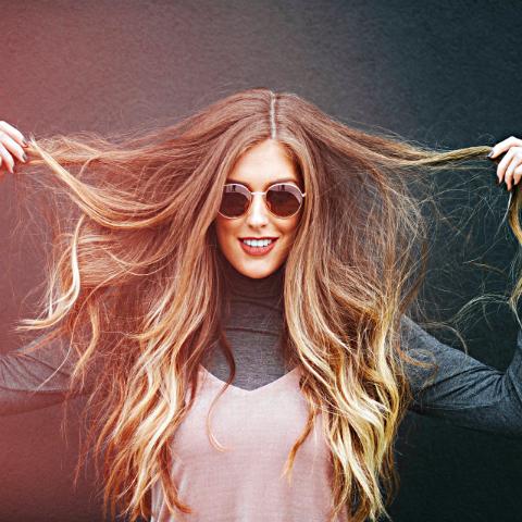 Girl with long hair and sunglasses