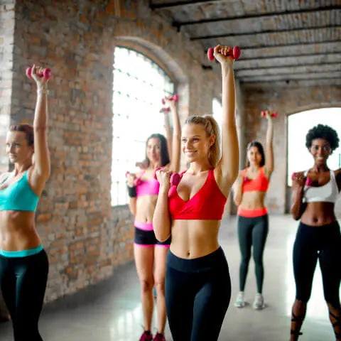 Women exercising happily with The solid Bar Company's probiotic deodorant