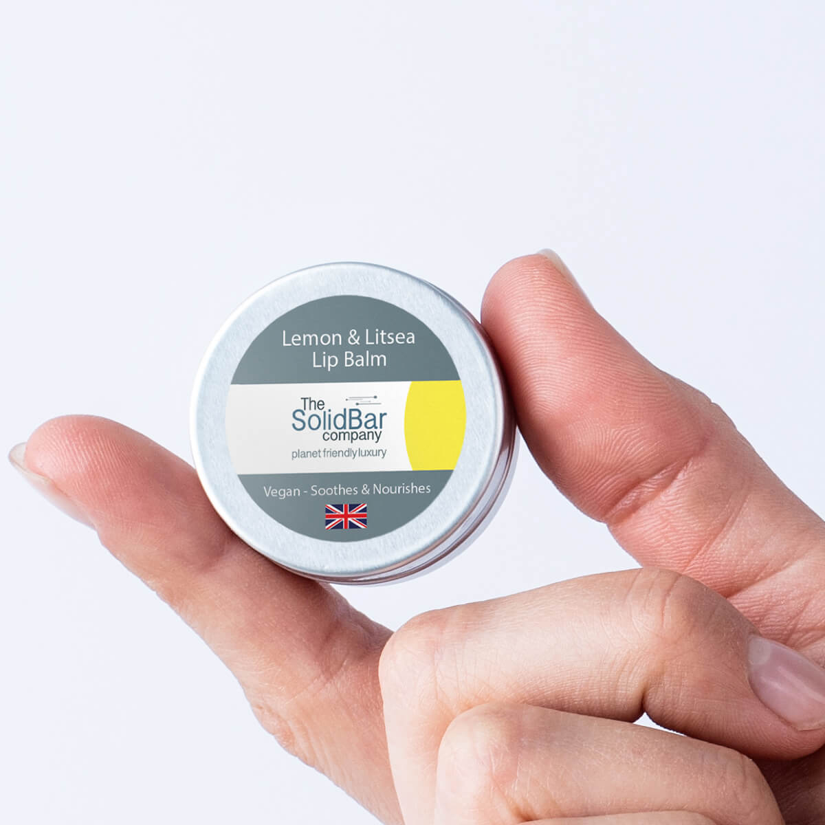 Lemon Litsea Lip Balm being held