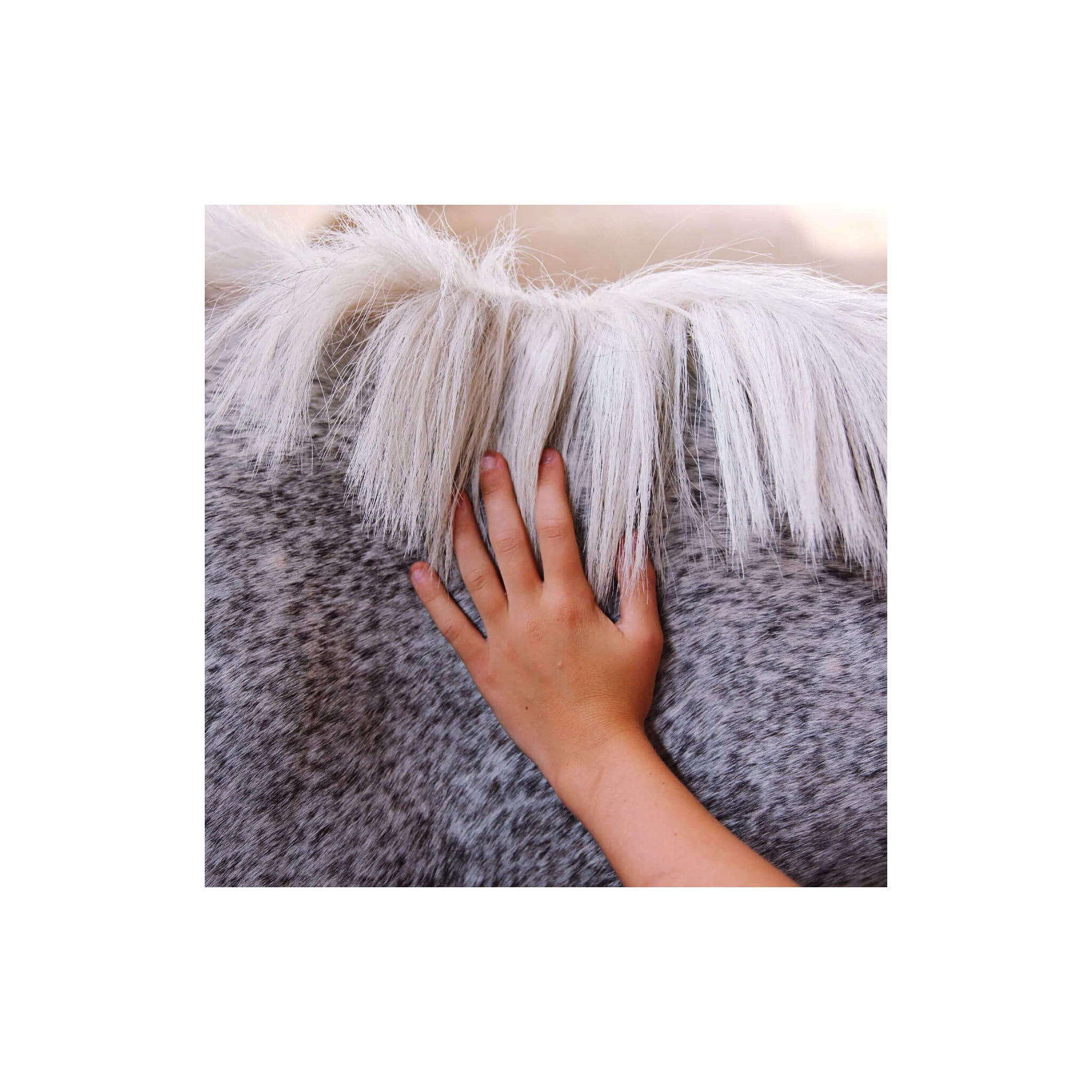 Mane and tail detangler on grey horse mane